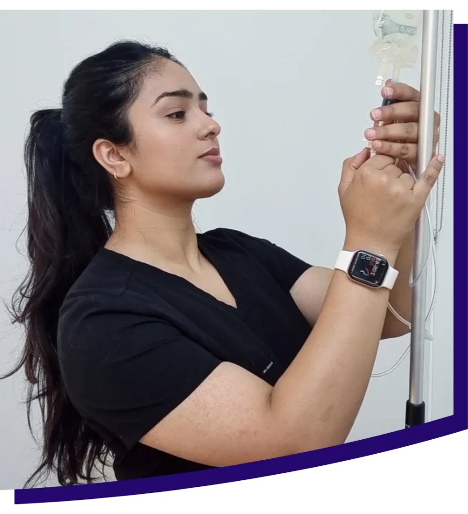 Nurse administering IV drip