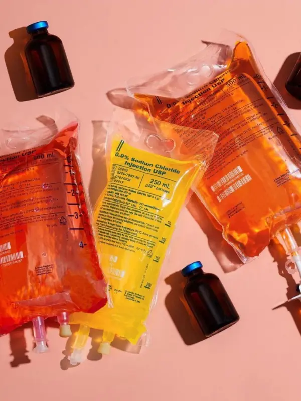 Flatlay of colourful IV bags